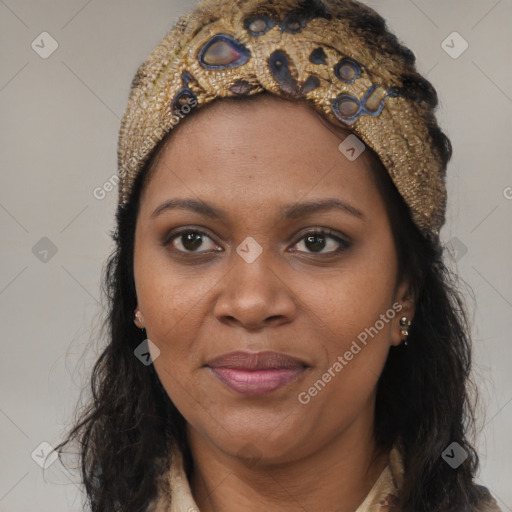 Joyful black young-adult female with long  brown hair and brown eyes