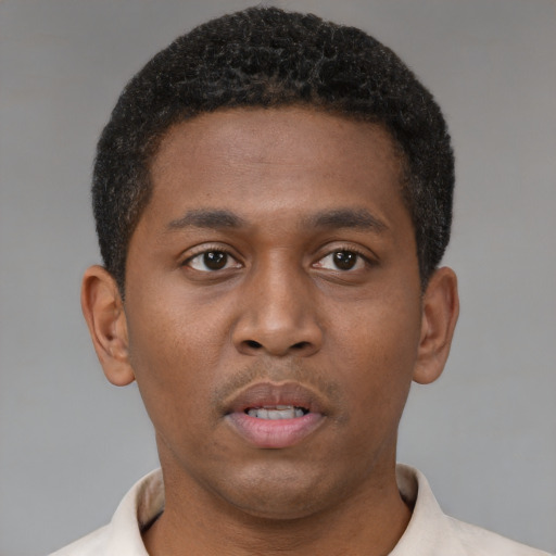 Neutral black young-adult male with short  brown hair and brown eyes
