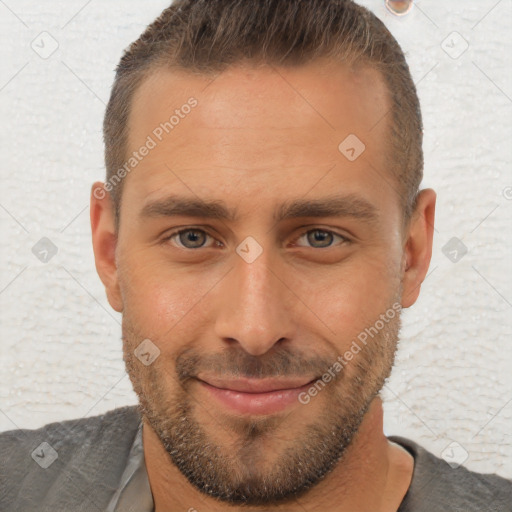 Joyful white adult male with short  brown hair and brown eyes