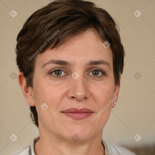 Joyful white adult female with short  brown hair and brown eyes