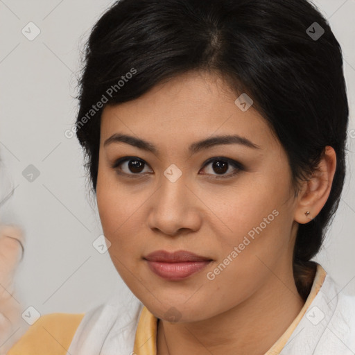 Joyful latino young-adult female with medium  brown hair and brown eyes