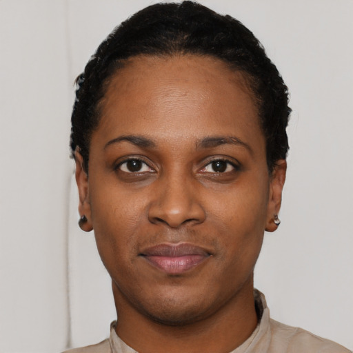 Neutral black young-adult female with short  black hair and brown eyes