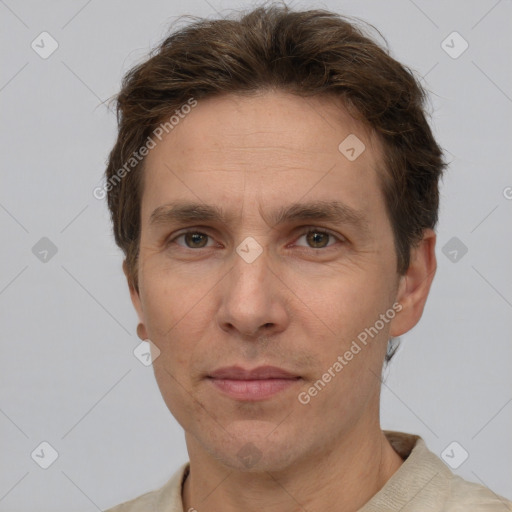 Neutral white adult male with short  brown hair and grey eyes