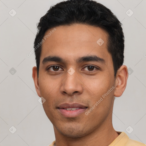 Neutral latino young-adult male with short  black hair and brown eyes