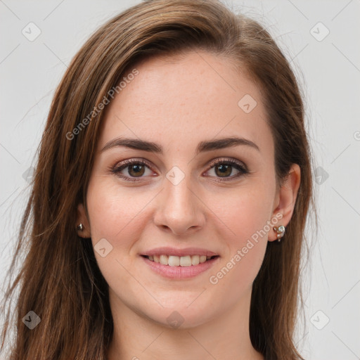 Joyful white young-adult female with long  brown hair and green eyes