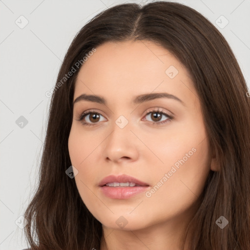 Neutral white young-adult female with long  brown hair and brown eyes