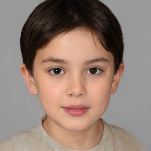 Joyful white child female with short  brown hair and brown eyes