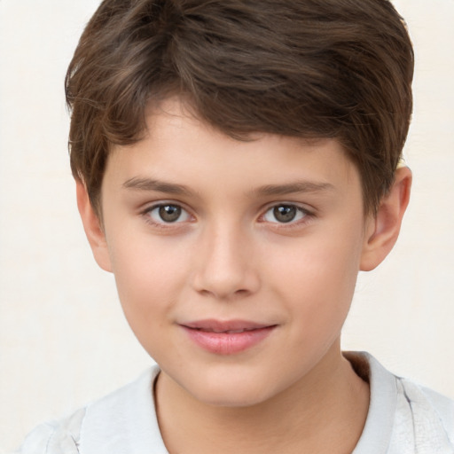 Joyful white child male with short  brown hair and brown eyes