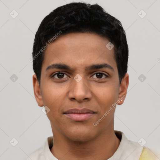 Joyful latino young-adult male with short  black hair and brown eyes