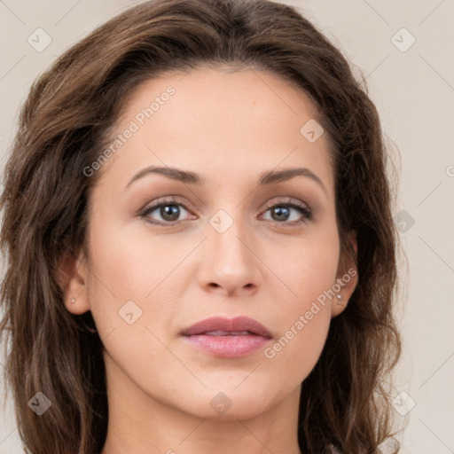 Joyful white young-adult female with long  brown hair and green eyes