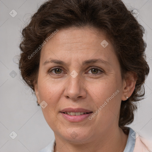 Joyful white adult female with short  brown hair and brown eyes