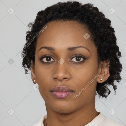 Neutral black young-adult female with short  black hair and brown eyes