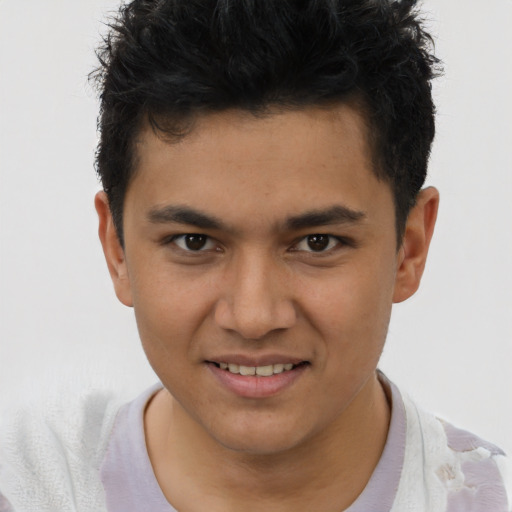 Joyful latino young-adult male with short  brown hair and brown eyes