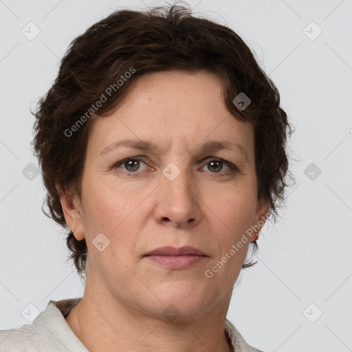 Neutral white adult female with short  brown hair and grey eyes