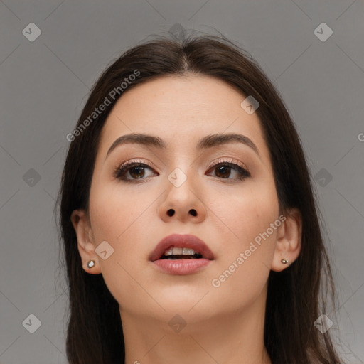 Neutral white young-adult female with long  brown hair and brown eyes