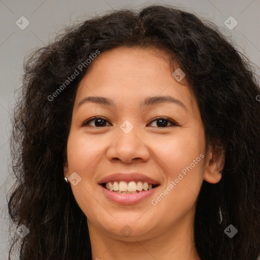 Joyful asian young-adult female with long  brown hair and brown eyes