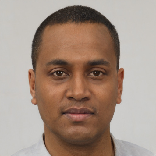 Neutral black young-adult male with short  brown hair and brown eyes