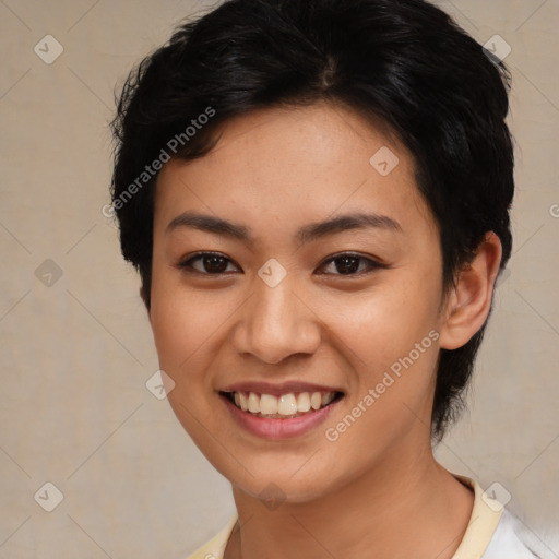 Joyful asian young-adult female with short  brown hair and brown eyes