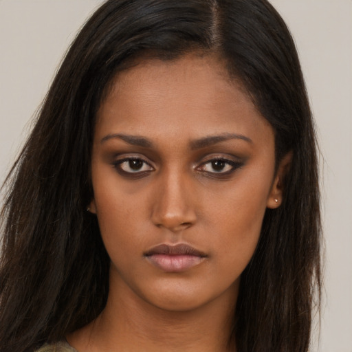 Neutral asian young-adult female with long  brown hair and brown eyes