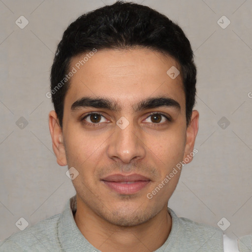 Joyful white young-adult male with short  black hair and brown eyes