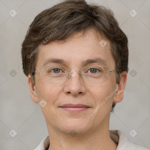 Joyful white adult male with short  brown hair and grey eyes