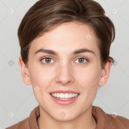 Joyful white young-adult female with short  brown hair and grey eyes