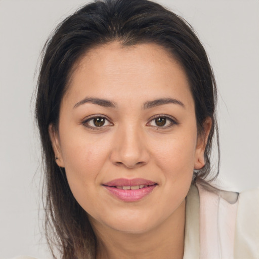 Joyful white young-adult female with medium  brown hair and brown eyes