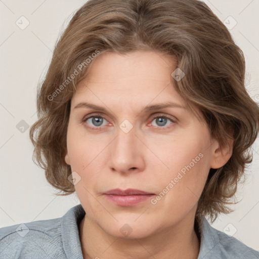 Neutral white young-adult female with medium  brown hair and grey eyes