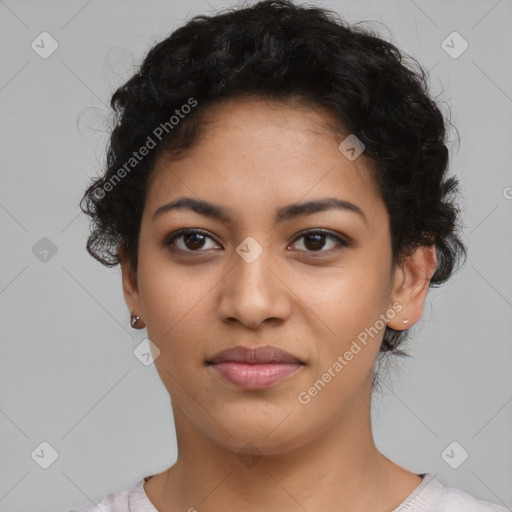 Joyful latino young-adult female with short  black hair and brown eyes