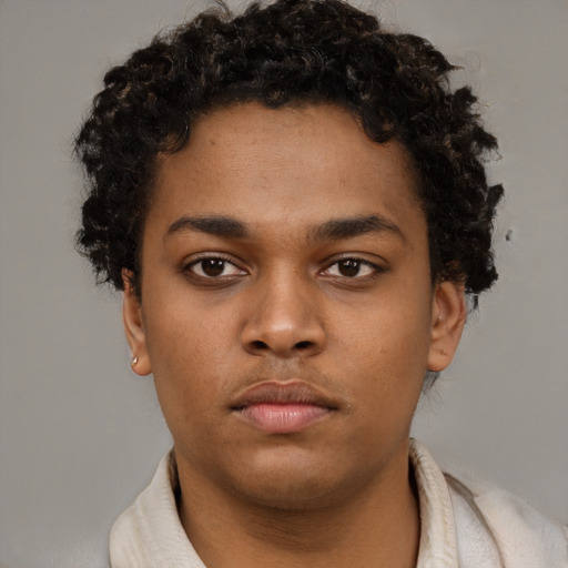Neutral black young-adult male with short  brown hair and brown eyes