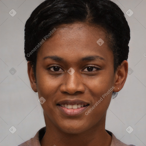 Joyful black young-adult female with short  black hair and brown eyes