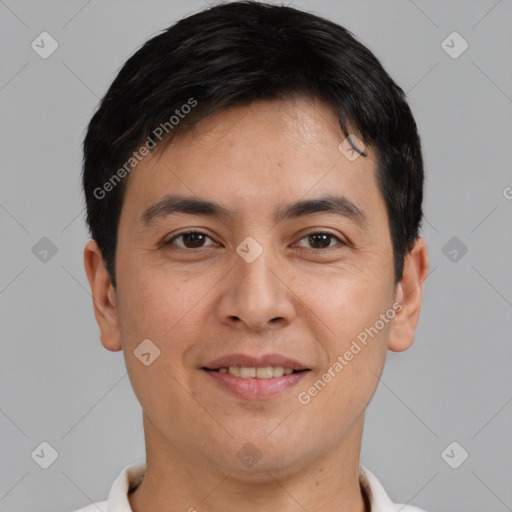 Joyful asian young-adult male with short  brown hair and brown eyes