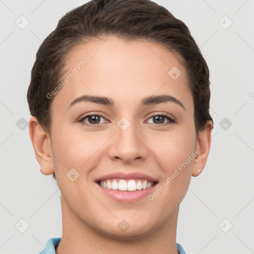 Joyful white young-adult female with short  brown hair and brown eyes