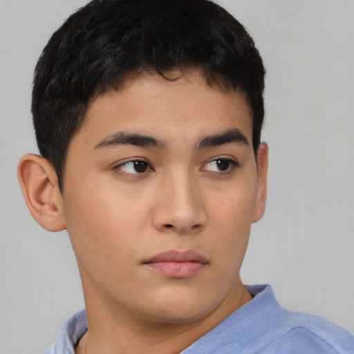 Neutral asian young-adult male with short  brown hair and brown eyes