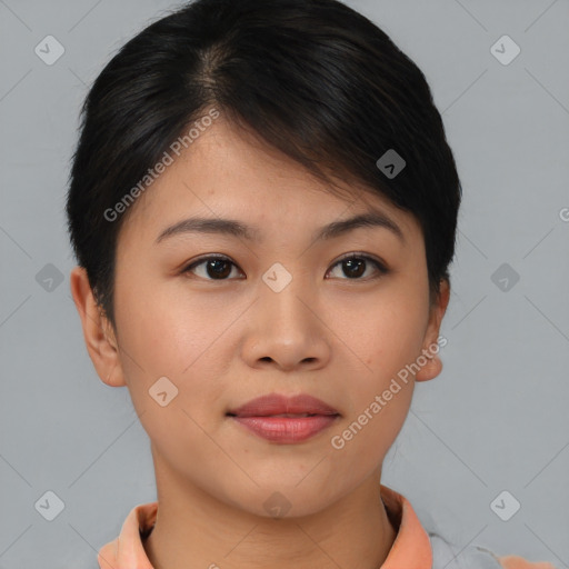 Joyful asian young-adult female with short  brown hair and brown eyes