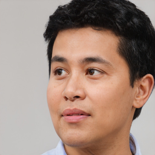 Neutral asian young-adult male with short  black hair and brown eyes