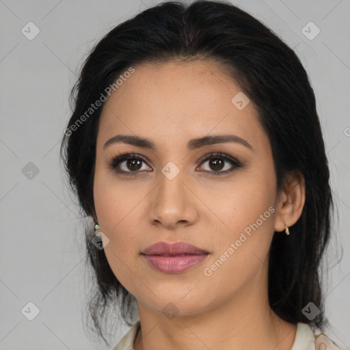 Joyful latino young-adult female with medium  black hair and brown eyes