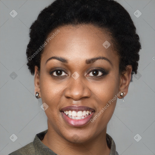 Joyful black young-adult female with short  black hair and brown eyes