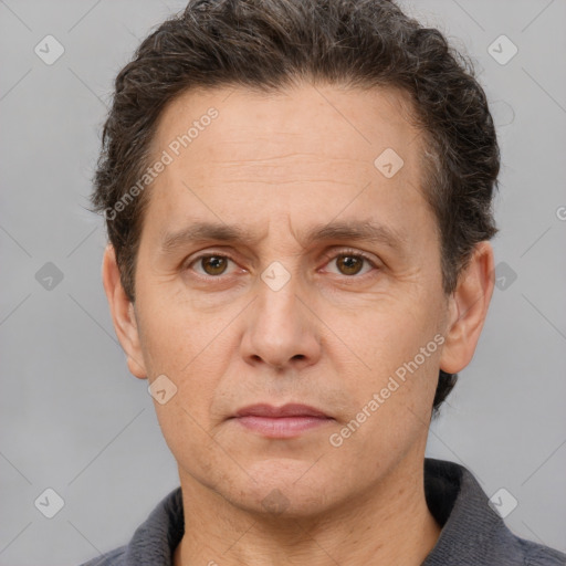 Neutral white adult male with short  brown hair and brown eyes