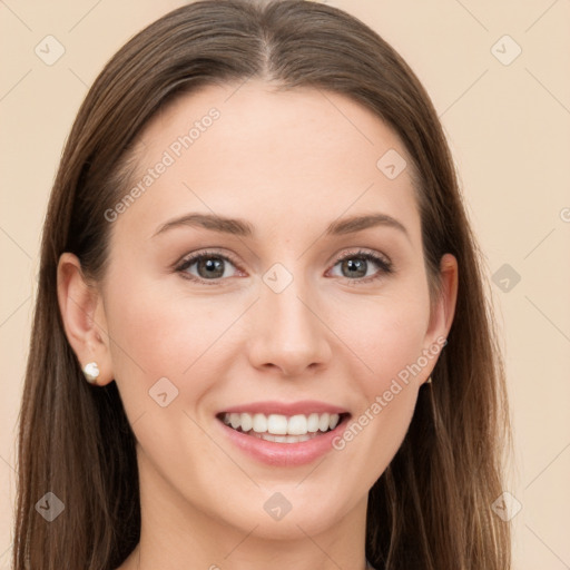 Joyful white young-adult female with long  brown hair and grey eyes