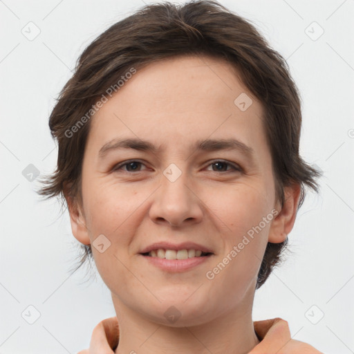 Joyful white young-adult female with short  brown hair and brown eyes