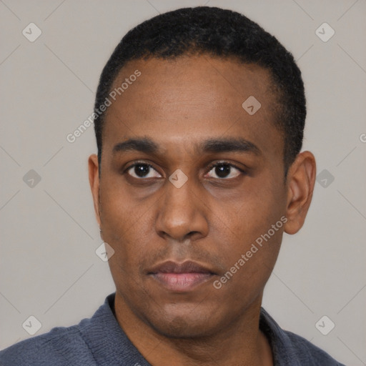 Neutral black young-adult male with short  black hair and brown eyes
