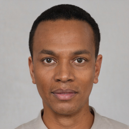 Neutral black young-adult male with short  black hair and brown eyes