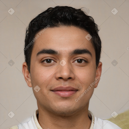 Joyful latino young-adult male with short  black hair and brown eyes
