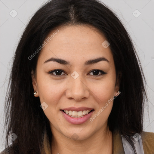 Joyful latino young-adult female with long  brown hair and brown eyes