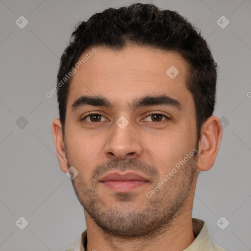 Neutral white young-adult male with short  black hair and brown eyes