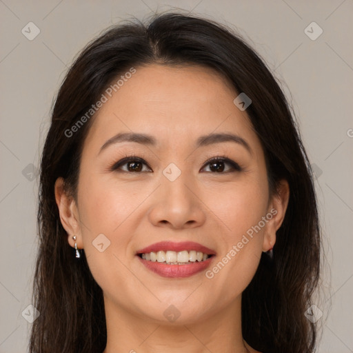 Joyful white young-adult female with long  brown hair and brown eyes