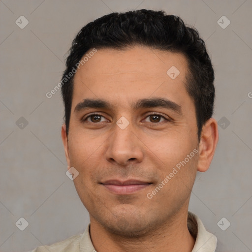 Joyful asian young-adult male with short  black hair and brown eyes