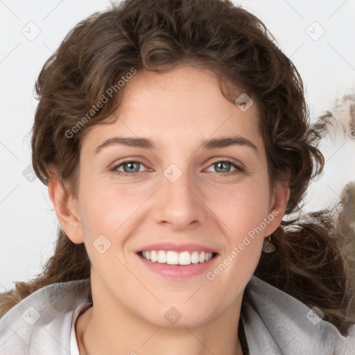 Joyful white young-adult female with medium  brown hair and blue eyes