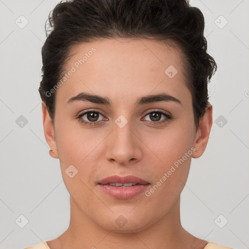 Joyful white young-adult female with short  brown hair and brown eyes